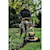 close up of brushless cordless push mower being used by a person to mow a lawn