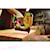 XR 18 GA Cordless Narrow Crown Stapler in action on a wooden board at a construction site