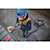 CORDLESS GRINDER WITH KICKBACK BRAKE being used by a workman on a wall