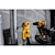 ATOMIC Brushless Compact Cordless half inch Hammer drill driver  drilling on  work surface.
