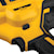 Close up of the lock button feature of a  XR 18 GA Cordless Narrow Crown Stapler