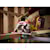 Brushless cordless circular saw cutting wooden beam.