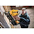 Cordless Paper Collated Framing Nailer in action on a wooden wall by a construction worker at a construction site