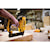 XR 18 GA Cordless Narrow Crown Stapler in action on a wooden board