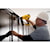 XR 18 GA Cordless Brad Nailer in action on a wooden structure by a construction worker