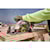 FLEXVOLT cordless worm drive style saw cutting wooden board.