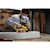 User sanding a wooden block with the DCW220B and DCB205 battery attached