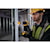 ATOMIC Brushless Compact Cordless half inch Hammer drill driver  being used by a person.